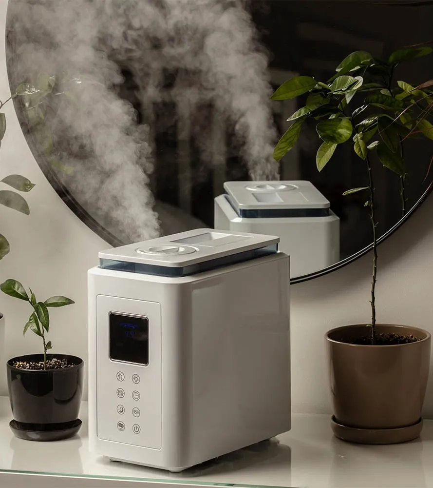 Whole home humidifier actively misting in a home setting -- Cold Factor indoor air quality services