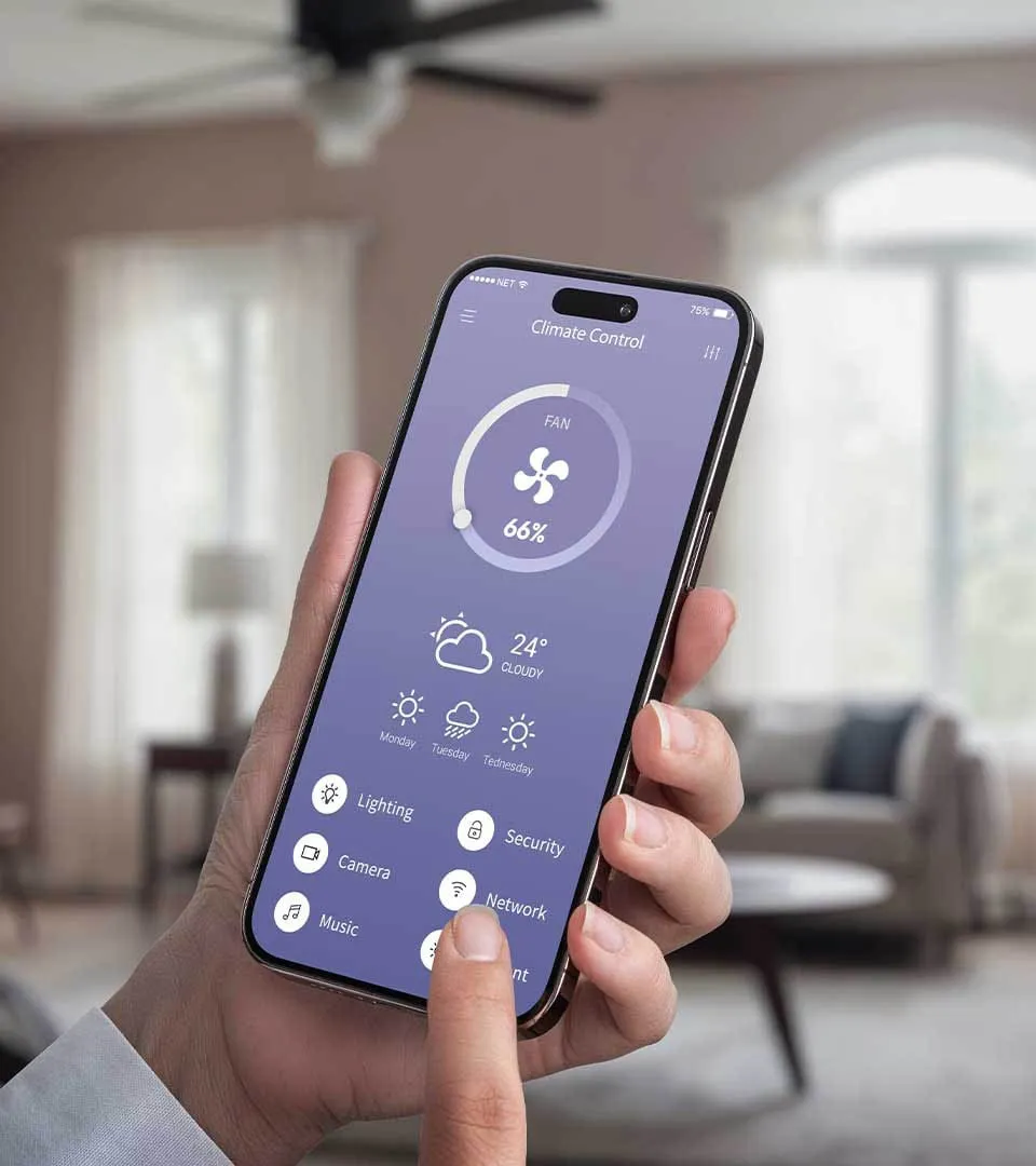 Person controlling home climate, lighting, and security from a smart home app on a smartphone -- Cold Factor home automation services