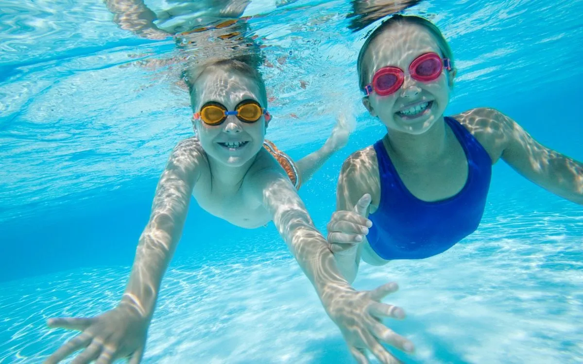 kids swimming in pool in lewisville