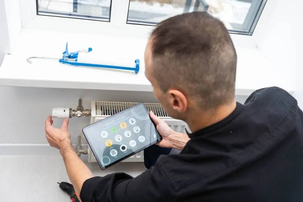 Technician inspecting a heating system