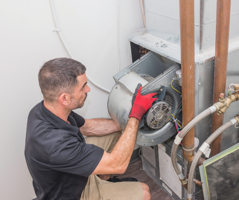 hvac professional technician working on unit