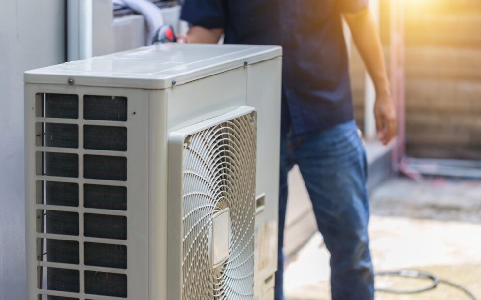 technician installing new ac system