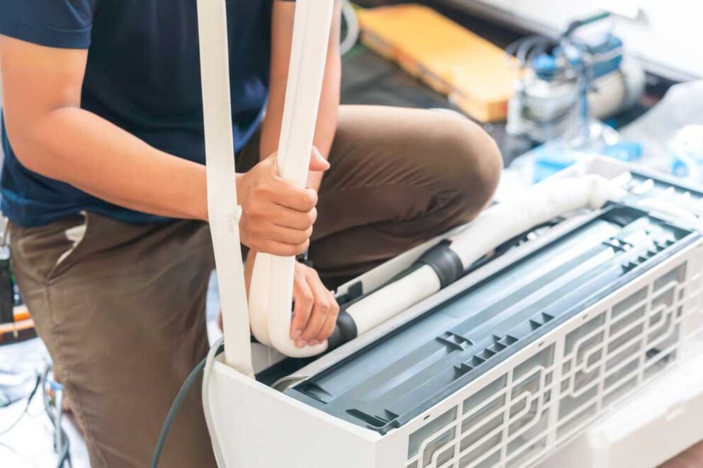 AC unit being installed